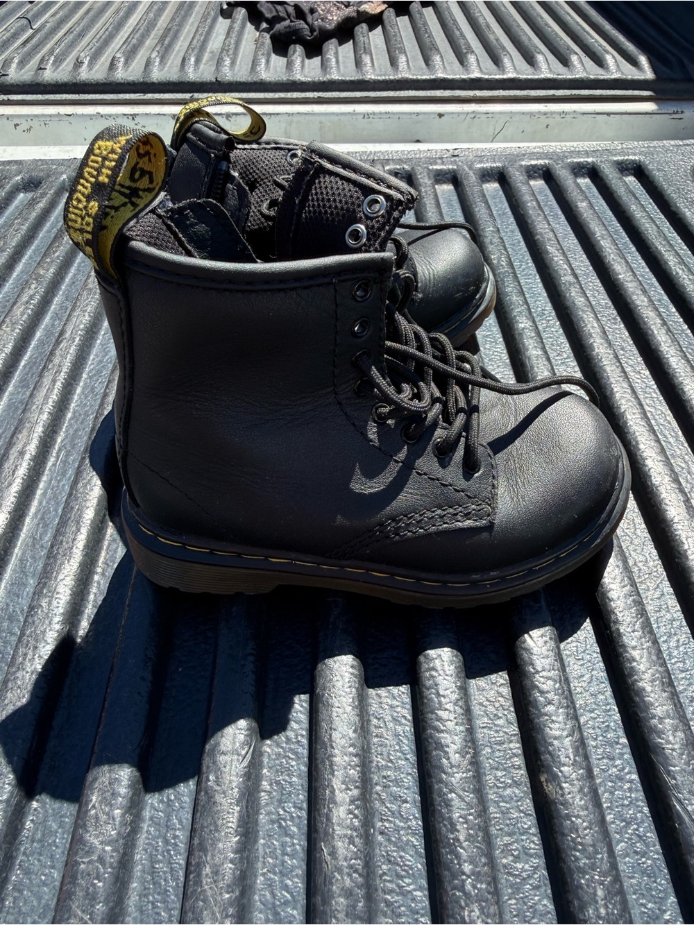 Dr. Martens Kids Black Leather Lace-Up Ankle Boots with Yellow Heel Loop